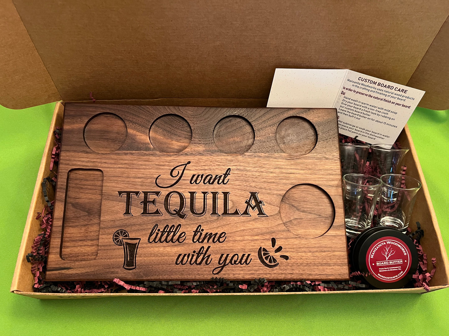 Personalized tequila shot board and a custom gift box includes wood tequila shot board, you can also include shot glasses, a shot glass stand, and wood board butter. A complete gift set for a wedding gift. 