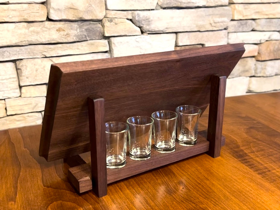 Walnut tequila shot tray holder is a perfect way to display your shot board when not in use. The shot glasses sit in routed holes behind your tequila shot board. Storage for shot flight board and tequila shot glasses, perfect gift for home bar.