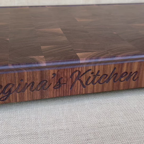 Personalized butcher block board with name engraved on the edge of the board.  Personalized chefs gift for the kitchen.  Personalized wedding gift custom butcher block made from walnut end grain. Perfect gift for the BBQ smoker.